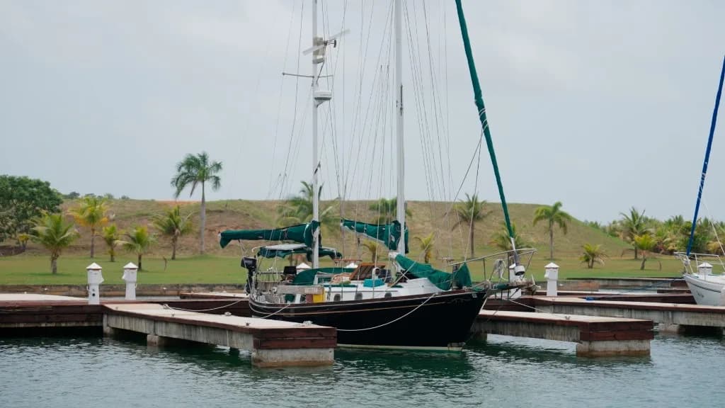 Sailboat berthed at Red Rock Marina finger docks
